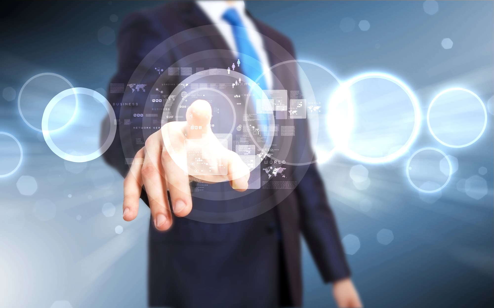 Man pointing toward virtual bubbles