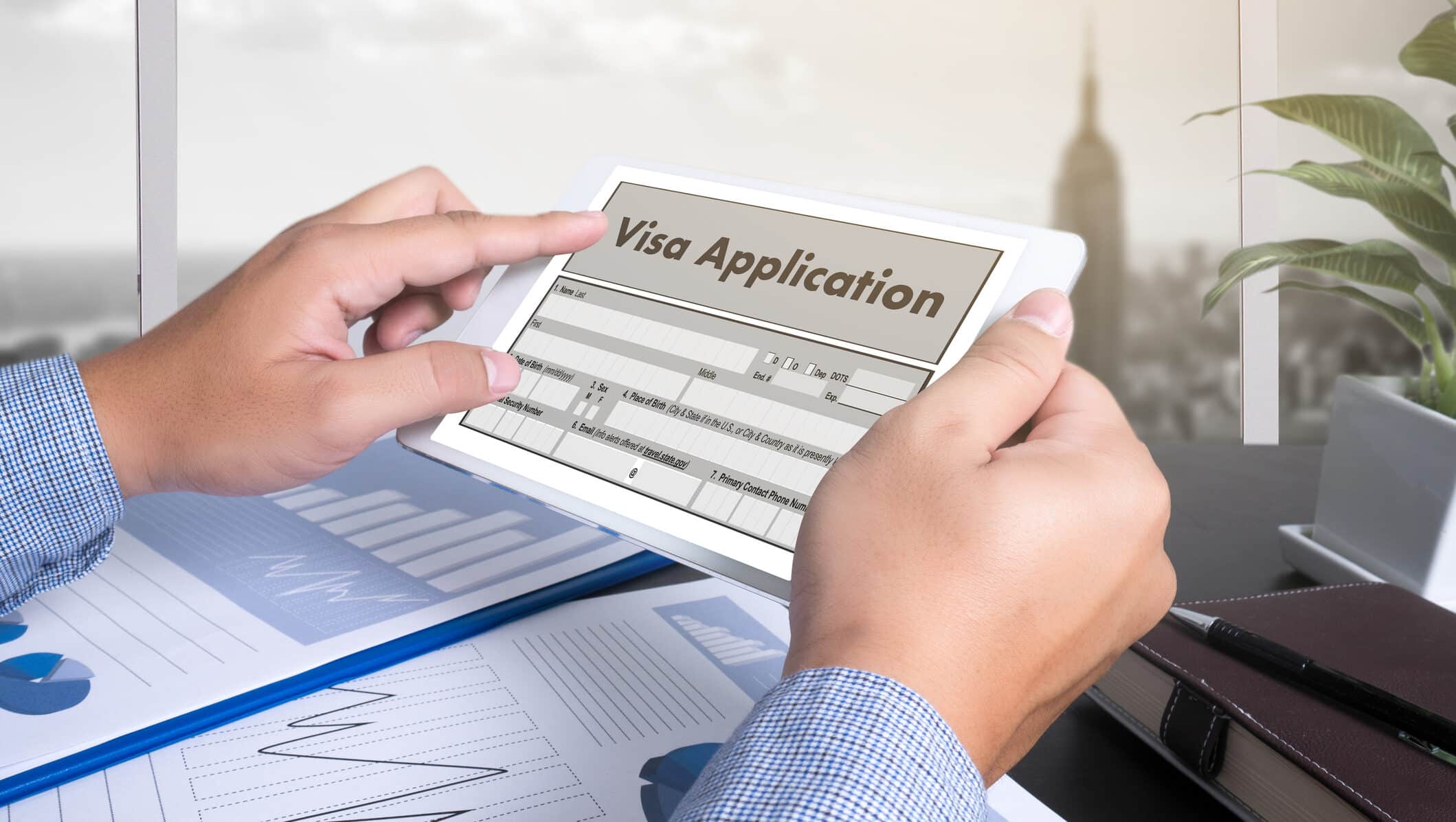 Person filling out visa application
